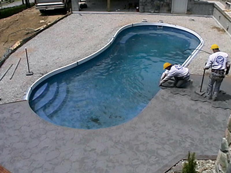 concreting around fibreglass pool